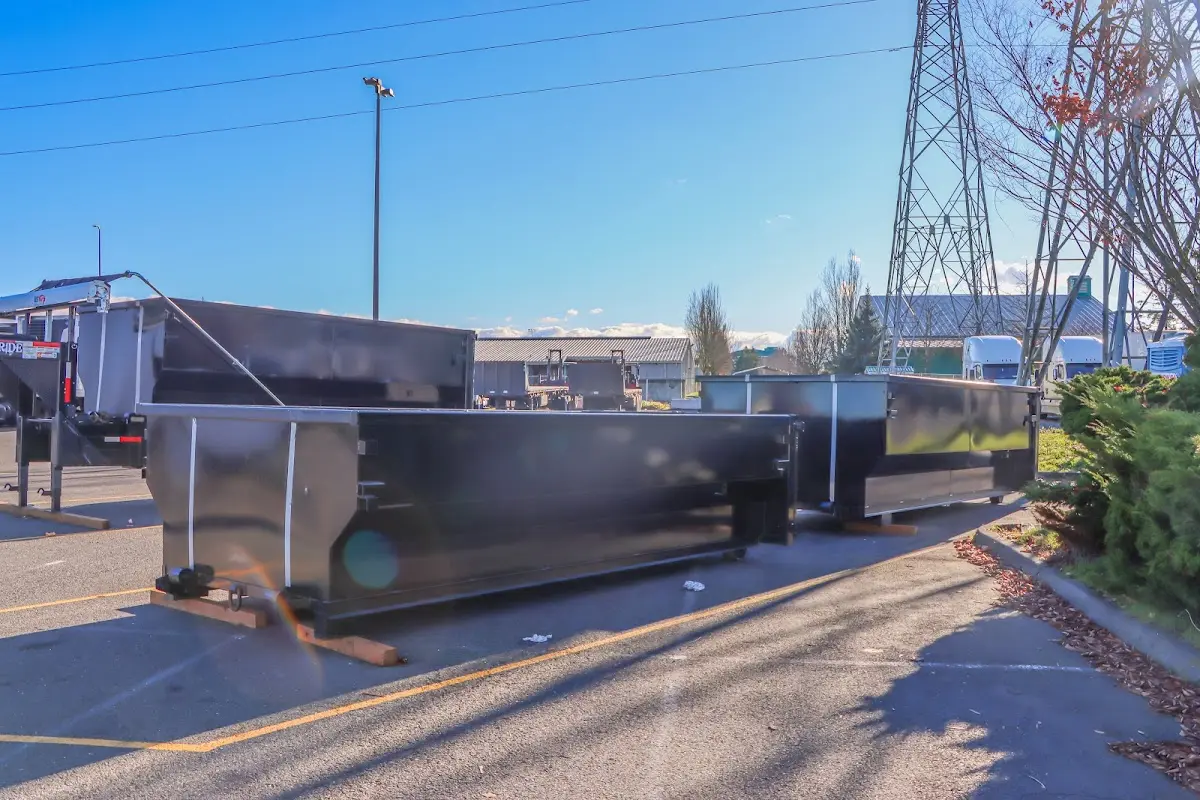 Roll-off dumpster ready for waste disposal at job site for Concrete Dumpster Rental in Union